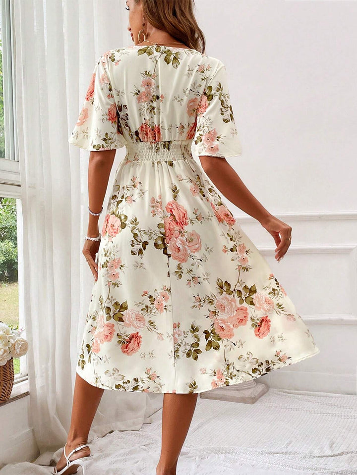 Robe midi à encolure en V | Élégance fluide et détails romantiques
