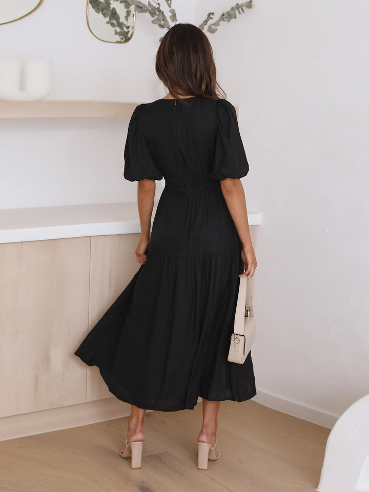 Robe fluide à col en V | Élégance naturelle et coupe aérienne