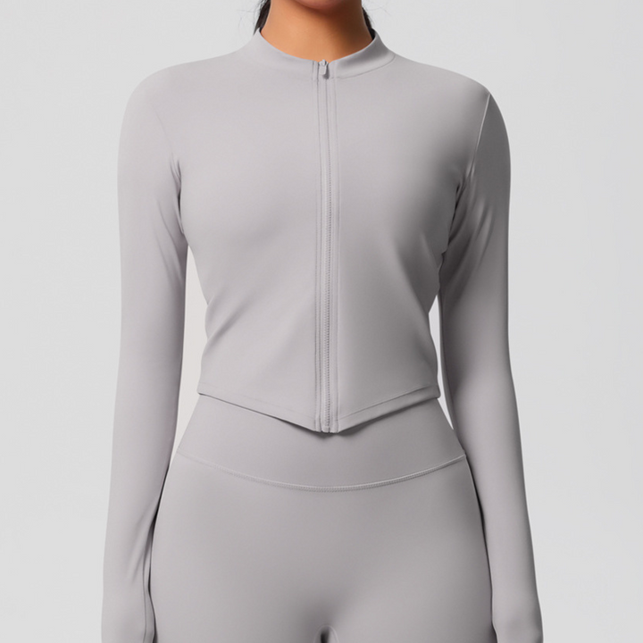 Haut de sport manches longues zippé | Performance élégante et protection respirante pour vos entraînements