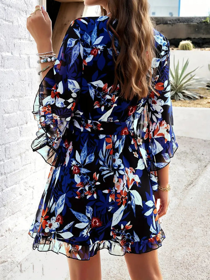 Robe portefeuille fleurie | Élégance aérienne pour l'été
