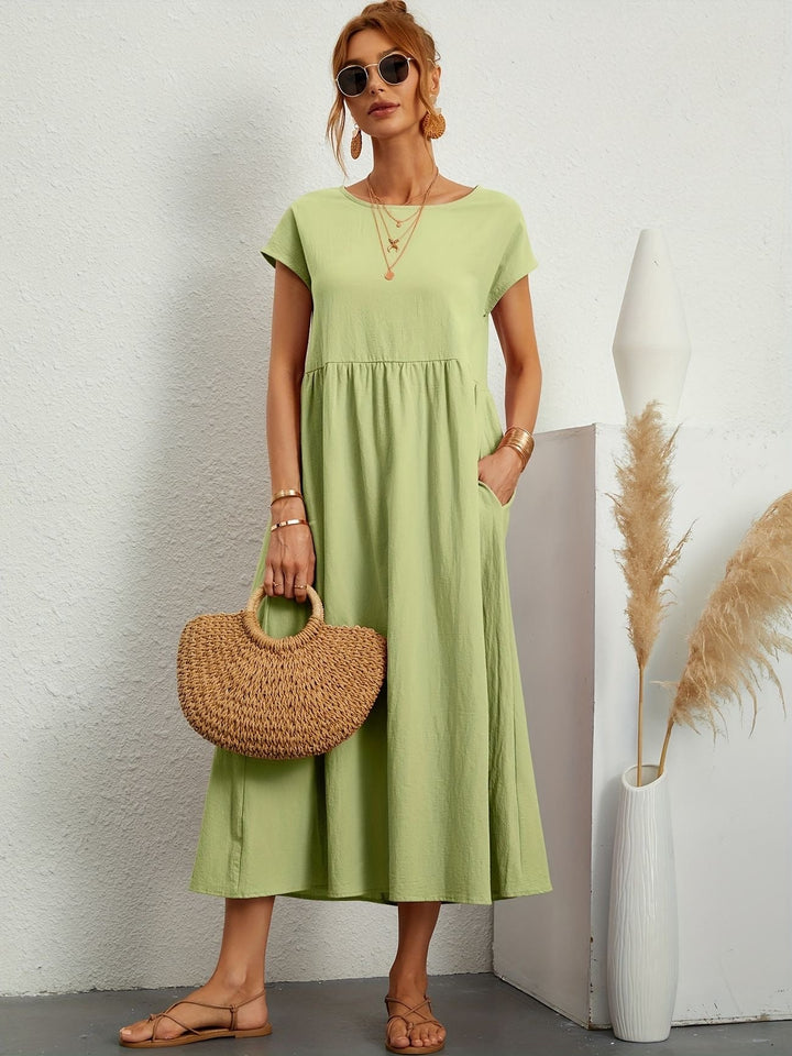 Robe midi ample à poches | Confort raffiné