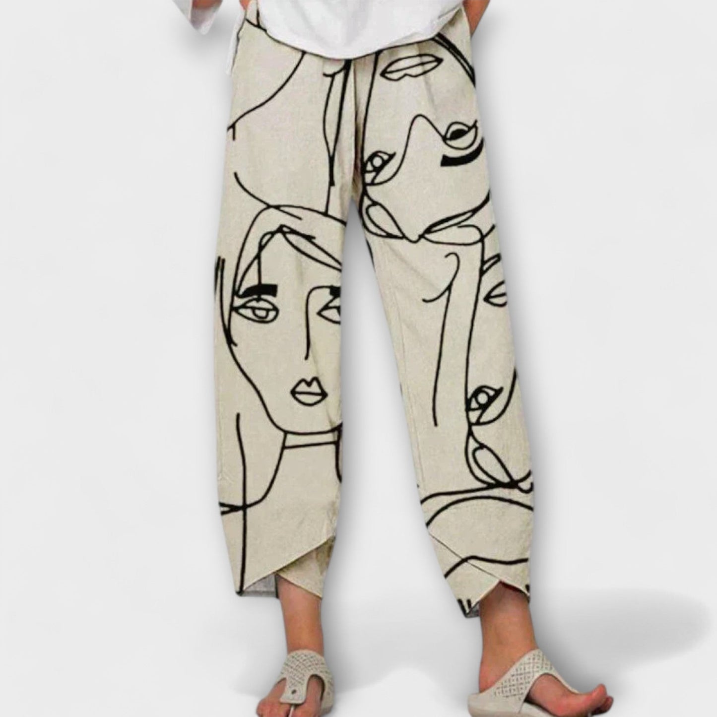 Pantalon large imprimé visage | Style artistique et décontracté