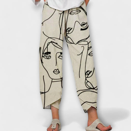 Pantalon large imprimé visage | Style artistique et décontracté